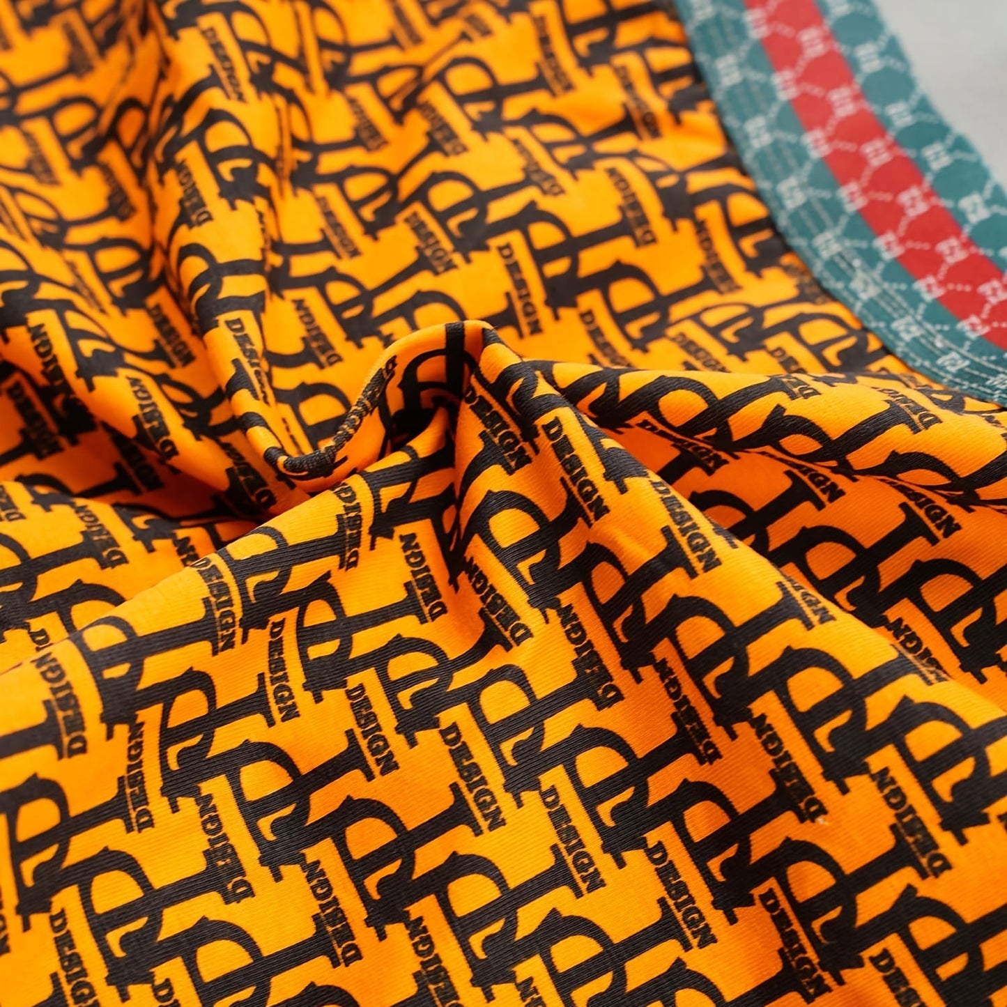 Orange background black text men's underwear